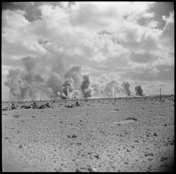 Date: 14 Nov 1941
Ref: DA-02150-F
NZ infantry on manoeuvres in the Western Desert with artillery providing support. Taken on 14 November 1941 by an official photographer.