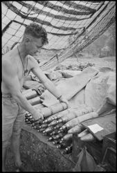 Date: 17 May 1944 By: Kaye, George Frederick, 1914-2004
Ref: DA-05858-F
A gun crew on one of the guns of the New Zealand Divisional Artillery on the Cassino Front in Italy, during World War II. Photograph taken on 17 May 1944 by George Frederick Kaye.