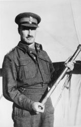 Date: late 1941 or early 1942
Ref: PAColl-6407-90
Stephen Cyril Ettick Weir in army uniform, in late 1941 or early 1942. He holds an artillery rammer. Photographer unidentifeied.
Inscriptions: Mount verso - Army Offical Photographic Collection Caption Brig S Weir
The artillery rammer was picked from the battlefield at Sidi Resegh by Brigadier Latham. It was later inscribed and presented to Freyberg by Latham. It is now housed in the Army Museum, Waiouru.