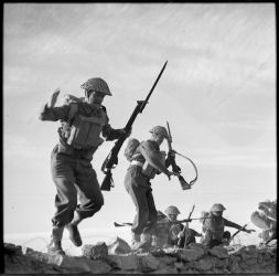 Date: 1 Feb 1942
Ref: DA-02368B-F
NZ troops training at NZ Base Camp in assault with the bayonet during World War II. Taken at Maadi, Egypt, on 1 February 1942 by an official photographer. NZ Troops at NZ Base Camp, Egypt. Assault Course with Bayonet