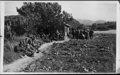Date: 1941
Ref: DA-01324-F
Mess parade of Reserve Mechanical Transport units below Galatos on Crete. Shows tilled ground and pumpkins growing alongside the path. Taken in 1941 by an official photographer. Mess Parade of Reserve Mechanical Transport units below Galatos - Crete 1941