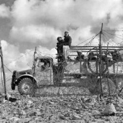 Date: 1941
Ref: DA-01634
Army Bedford truck going through the Italian frontier wire at the opening of the 2nd Libyan Campaign. Taken in Egypt in 1941.
Inscriptions: Backing board verso - top centre - 2nd Libyan Campaign, opens. Forces go through Italian Frontier wire at dawn. Kiwis Begin 2nd Libyan Campaign